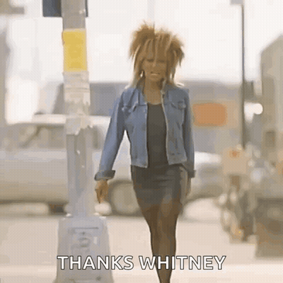 Woman In Denim Jacket Saying Thanks Whitney GIF