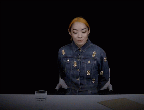 Woman In Denim Jacket Sitting GIF