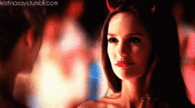 Woman In Devil Costume Looking At Man GIF