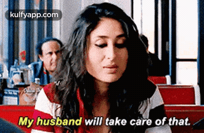 Woman In Diner Talking To Husband Behind Her GIF