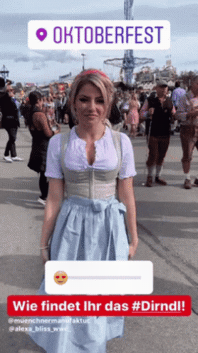Woman In Dirndl In Front Of Oktoberfest Sign GIF