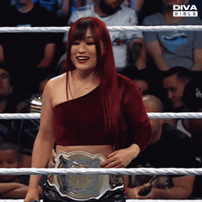 Woman In Diva Bible Ring Holding Wrestling Belt GIF
