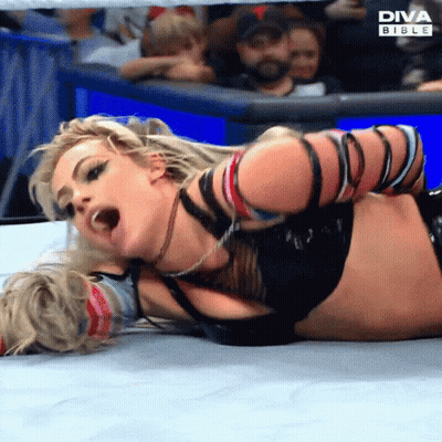 Woman In Diva Bible Wrestling Match GIF