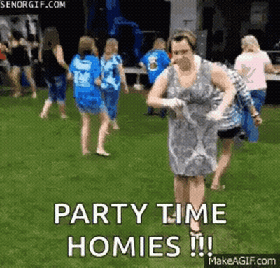 Woman In Dress Dancing In Grass With Crowd GIF
