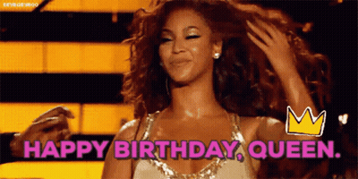 Woman In Dress Holding Hair Saying Happy Birthday Queen GIF