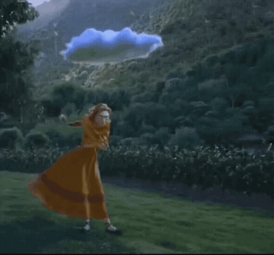 Woman In Dress Holding Yellow Umbrella In Field GIF