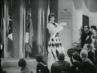 Woman In Dress On Stage GIF