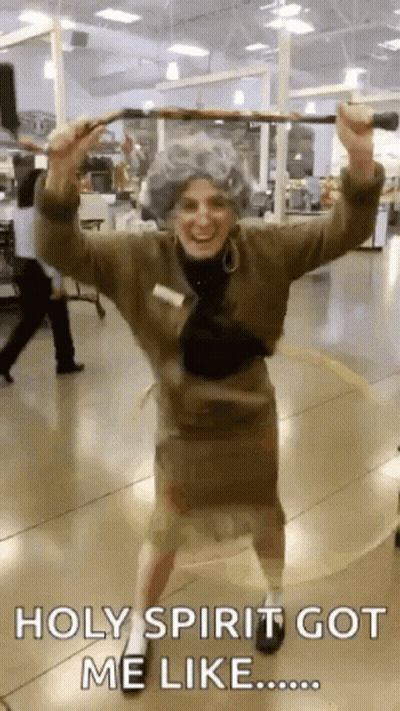 Woman In Elderly Costume Holding Cane GIF