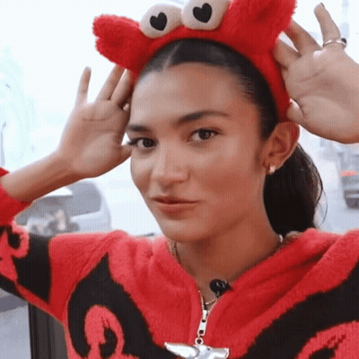 Woman In Elmo Headband GIF