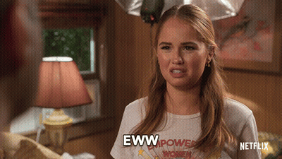 Woman in Empower Women Shirt Saying Eww