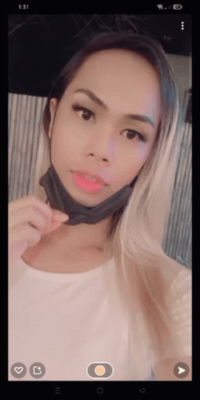 Woman In Face Mask Taking Selfie GIF