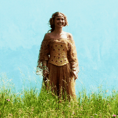 Woman in Fancy Dress in Tall Grass