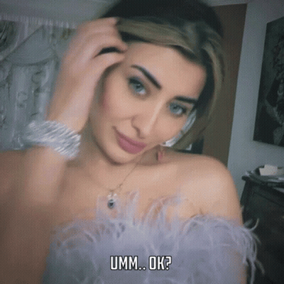 Woman In Feathered Dress Umm Ok GIF