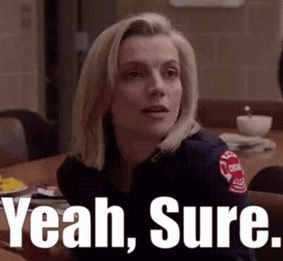 Woman In Firefighter Uniform Saying Yeah Sure GIF