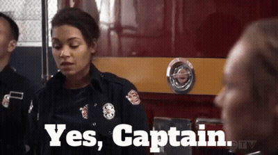 Woman In Firefighter Uniform Says Yes Captain GIF