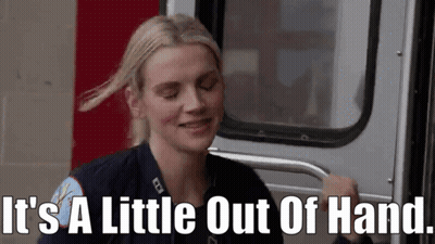 Woman In Firefighter Uniform Smiling Next To Fire Truck GIF
