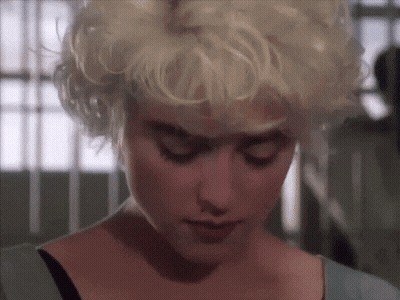 Woman In Flamingo Shirt Making Funny Face Saying Crazy GIF