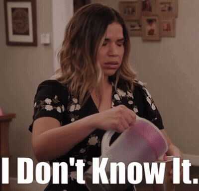 Woman In Floral Dress Holding Pitcher Saying I Don't Know It GIF