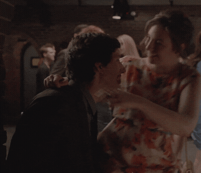 Woman In Floral Dress Hugging Man GIF