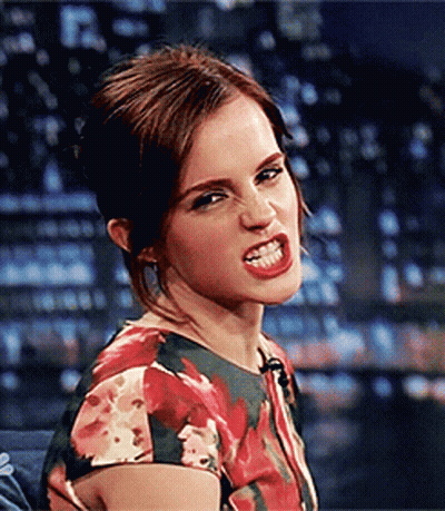 Woman In Floral Dress Making Funny Face GIF