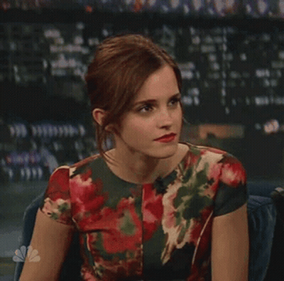 Woman In Floral Dress Making Funny Face GIF