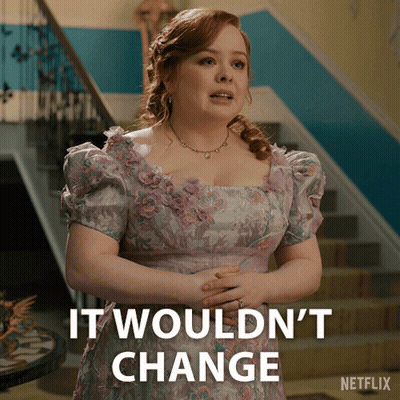 Woman In Floral Dress Says It Wouldn't Change GIF