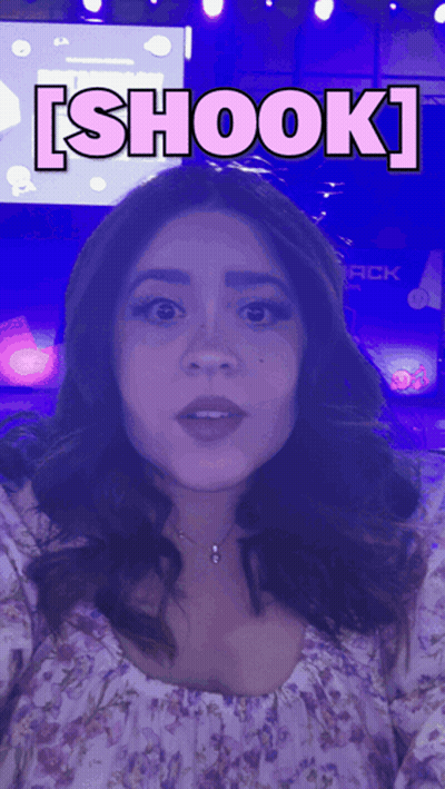 Woman In Floral Dress Says Shook GIF