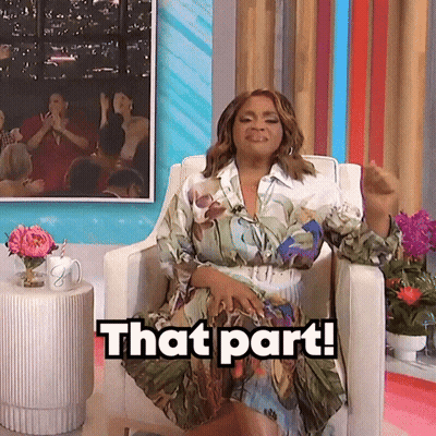 Woman In Floral Dress Sitting And Talking GIF