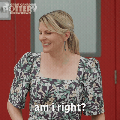 Woman In Floral Dress Smiling Am I Right GIF