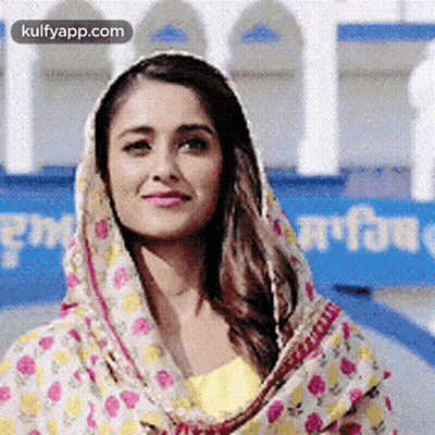Woman In Floral Scarf Smiling GIF