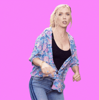 Woman In Floral Shirt Kicking Foot GIF