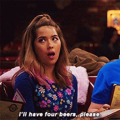 Woman In Floral Shirt Says I'll Have Four Beers Please GIF