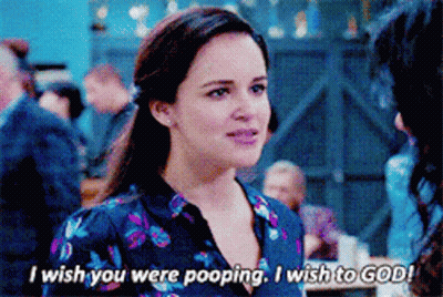 Woman In Floral Shirt Says I Wish You Were Pooping GIF