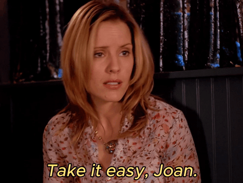 Woman In Floral Shirt Says Take It Easy Joan GIF
