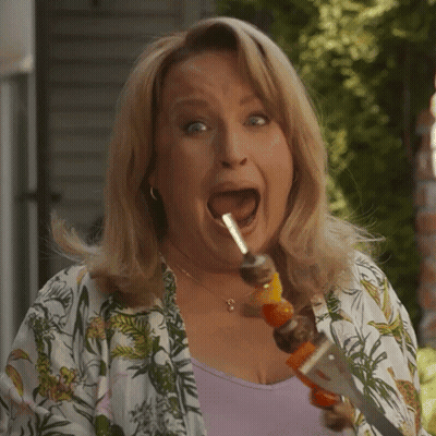 Woman In Floral Shirt Surprised GIF