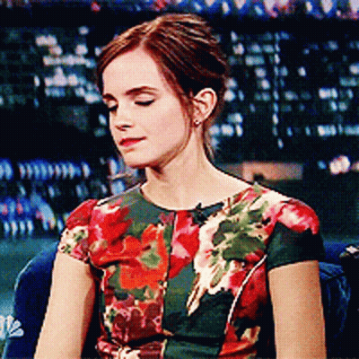 Woman In Floral Top Eyes Closed On Couch GIF