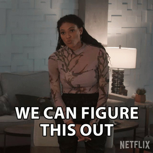 Woman In Floral Top Says We Can Figure This Out GIF