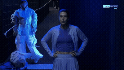 Woman In Front Of Bein Sports Sign GIF