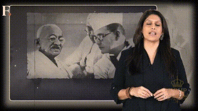 Woman In Front Of Black And White Gandhi Photo GIF