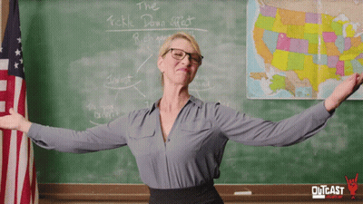 Woman In Front Of Blackboard Saying Tickle Down Effect GIF