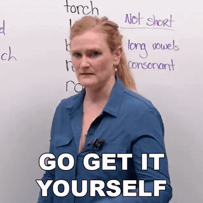 Woman In Front Of Board Saying Go Get It Yourself GIF