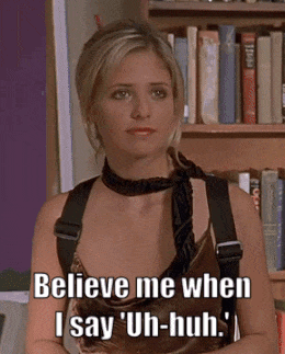 Woman In Front Of Bookshelf Says Believe Me When I Say Uh Huh GIF