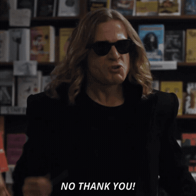 Woman In Front Of Bookshelf Says No Thank You GIF