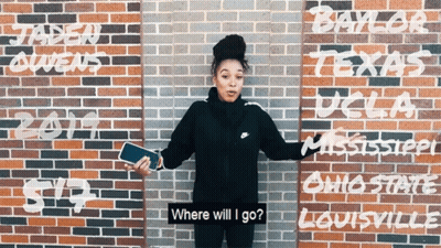 Woman In Front Of Brick Wall Saying Where Will I Go GIF