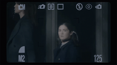 Woman In Front Of Camera Saying 125 GIF