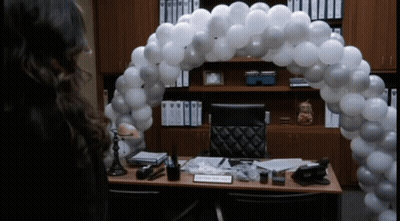 Woman In Front Of Captain Smith Name Tag GIF
