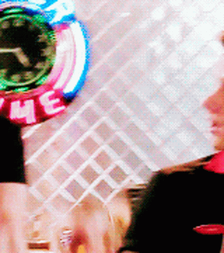 Woman In Front Of Clock Saying Where GIF