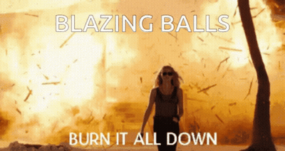 Woman in Front of Explosion Blazing Balls Burn It All Down