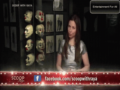 Woman In Front Of Facebook Banner GIF