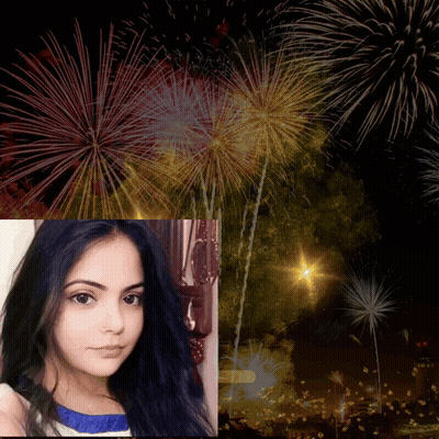 Woman In Front Of Fireworks GIF